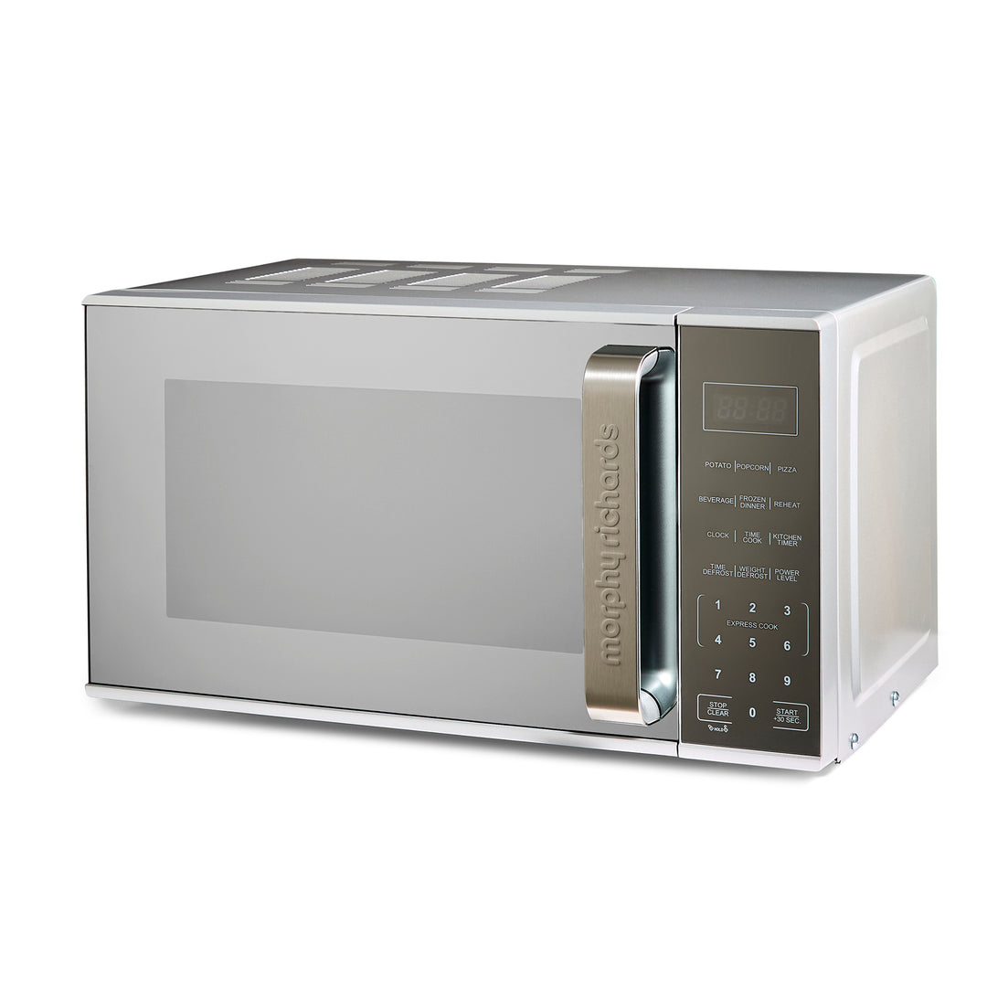 Stainless steel microwave oven on a white background