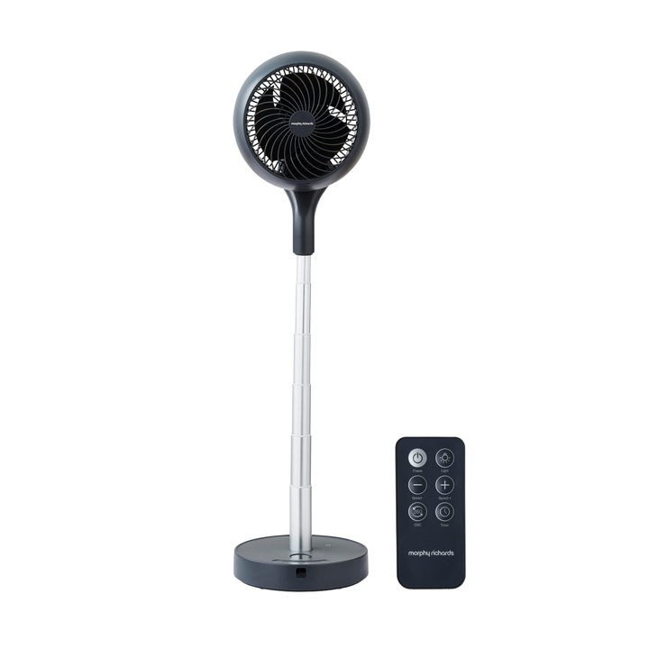 Black oscillating tower fan with remote control on a white background