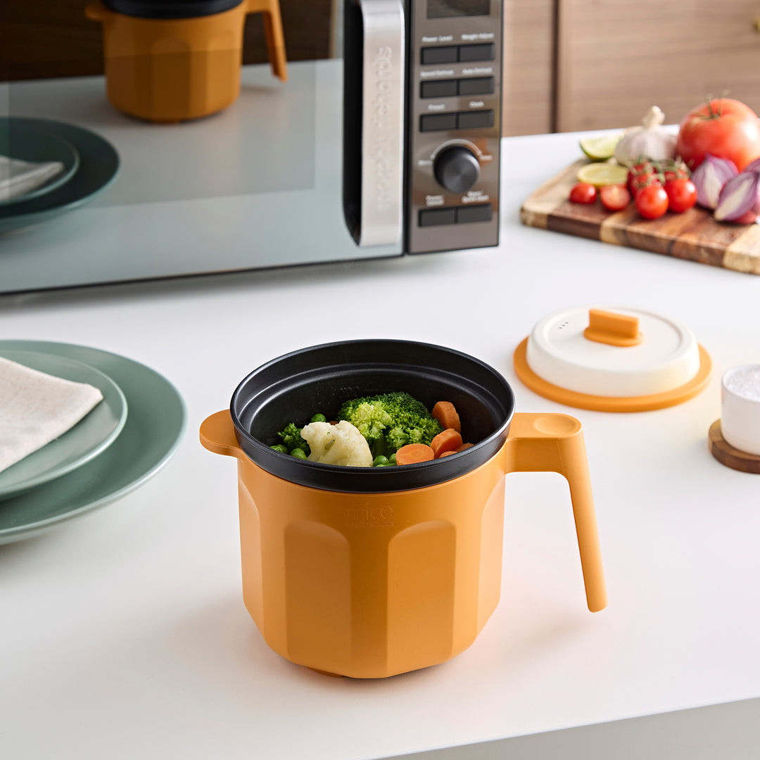 Microwave Saucepan with vegetables inside 