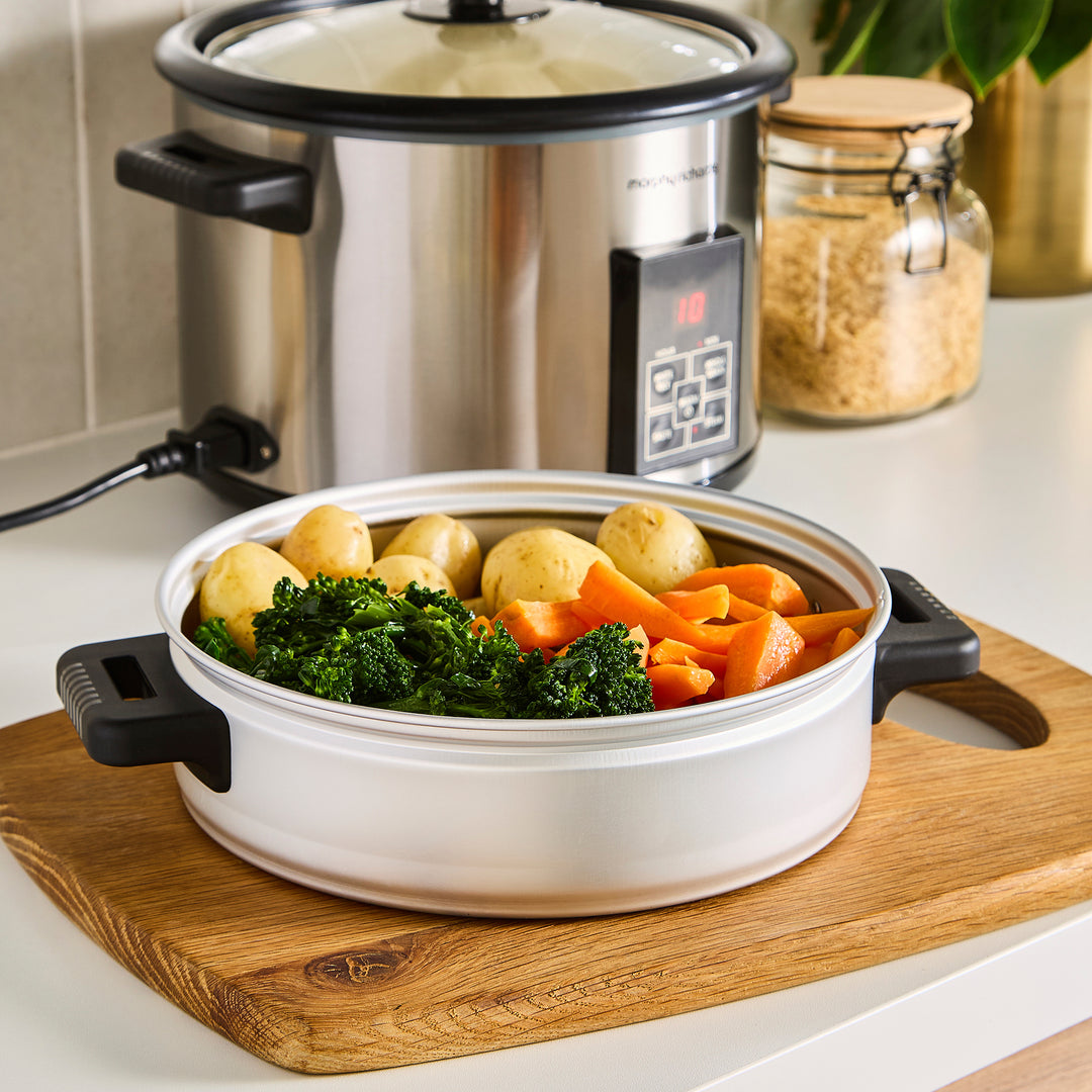 Stainless steel steamer tray from Morphy Richards rice cooker with vegetables in side