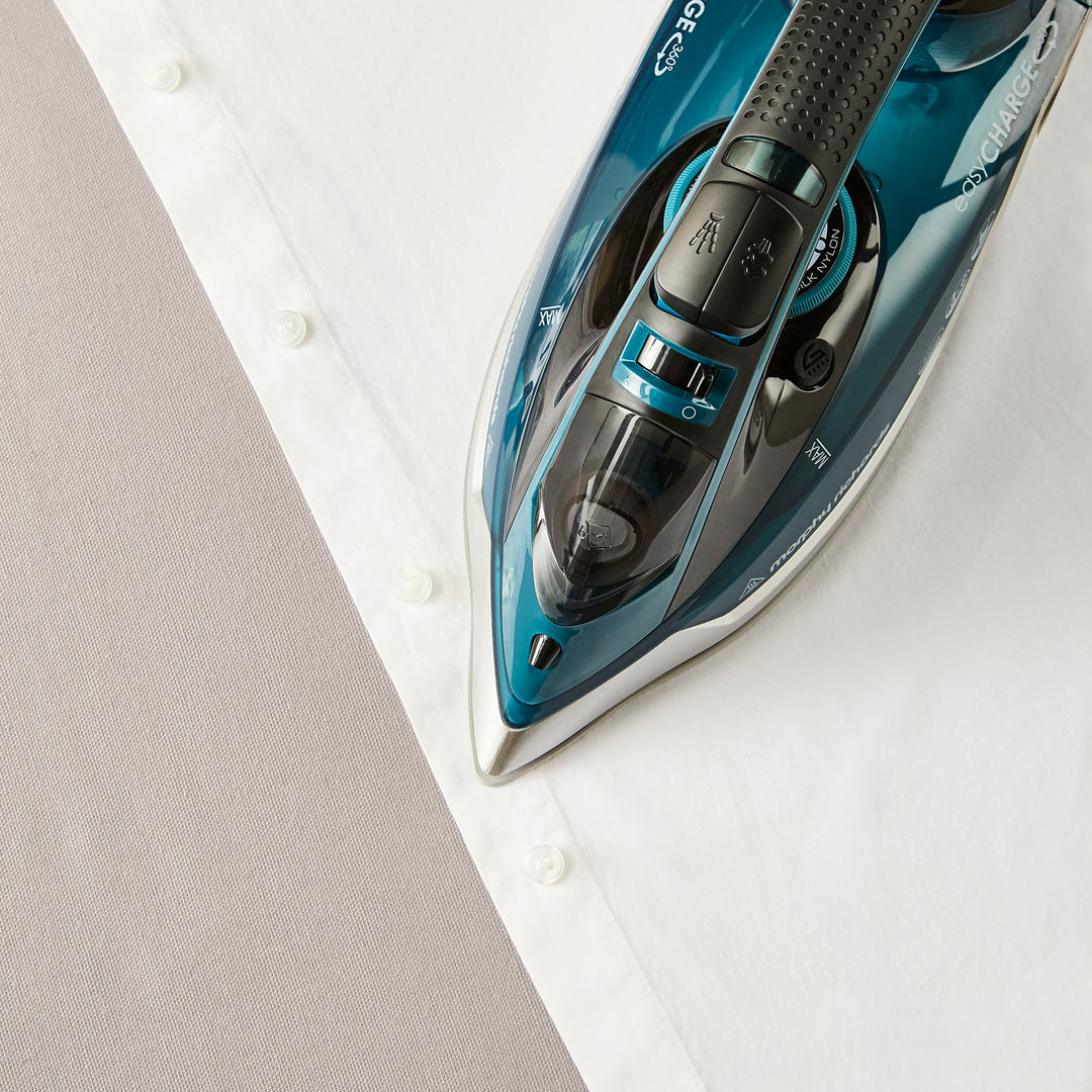 cordless iron in utility room