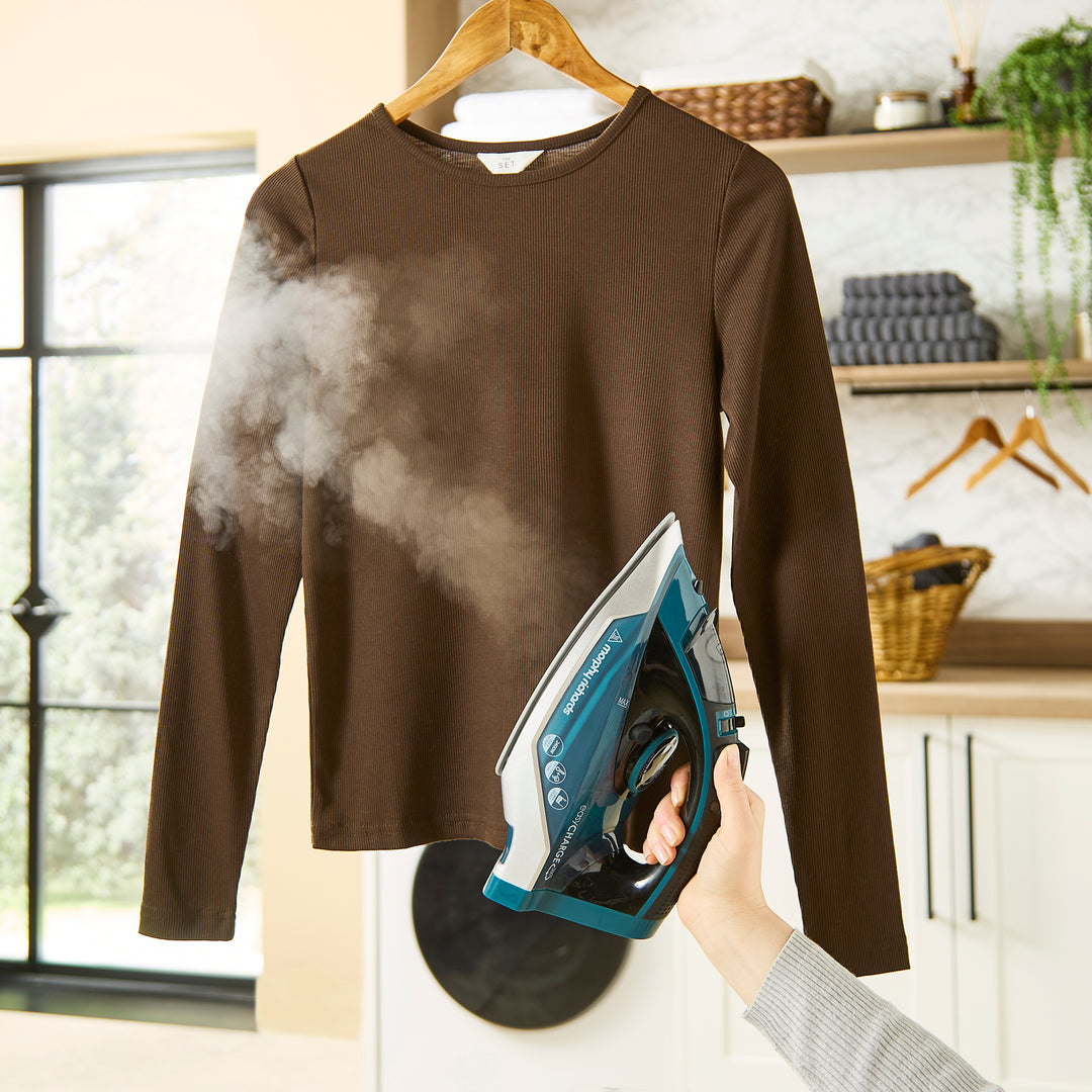 cordless iron in utility room