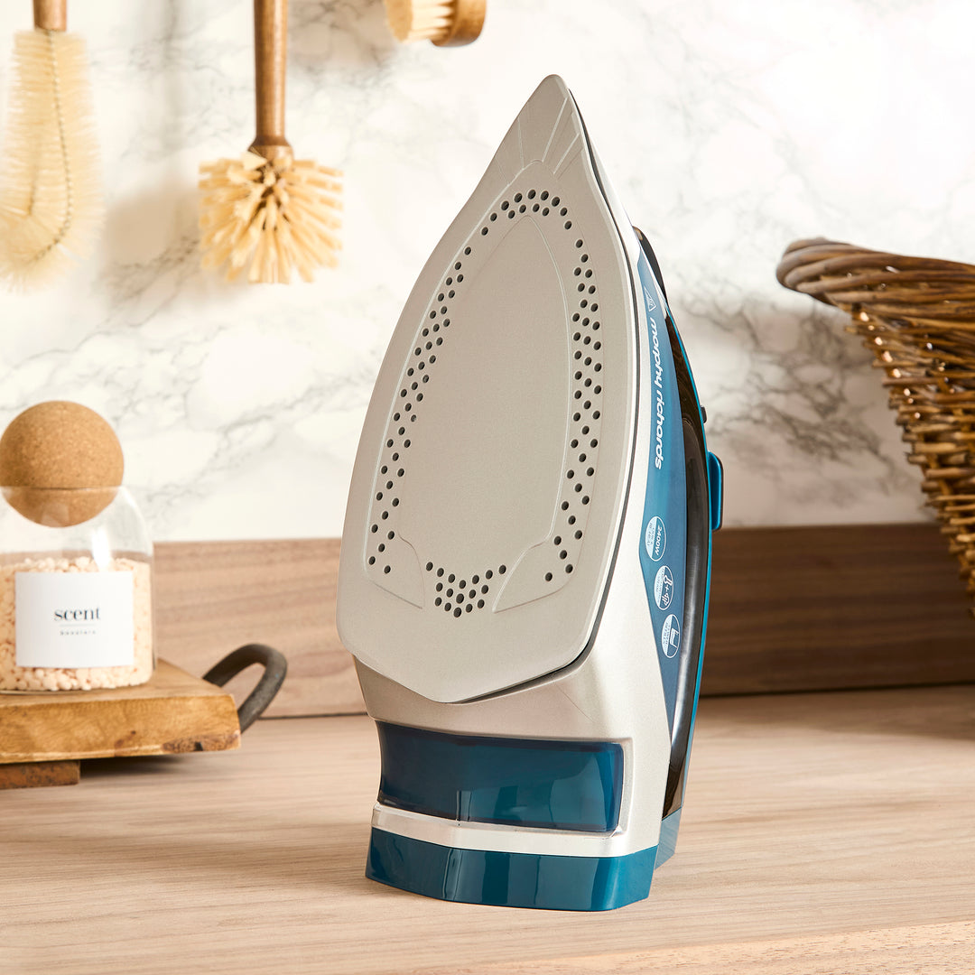 cordless iron in utility room