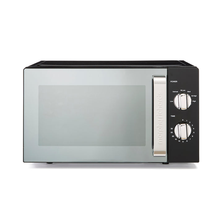 black microwave on white background