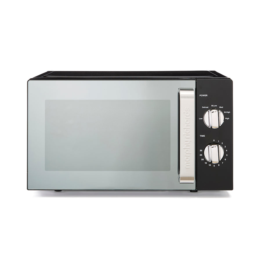 black microwave on white background