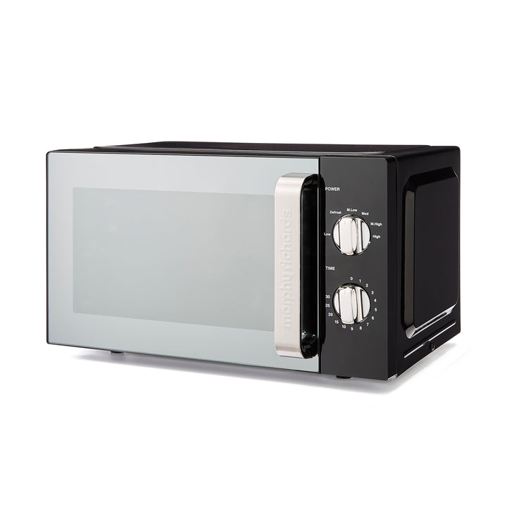 black microwave on white background