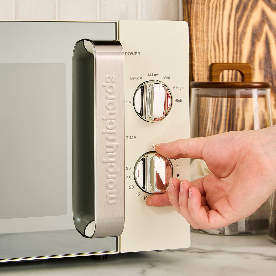 cream microwave on kitchen counter