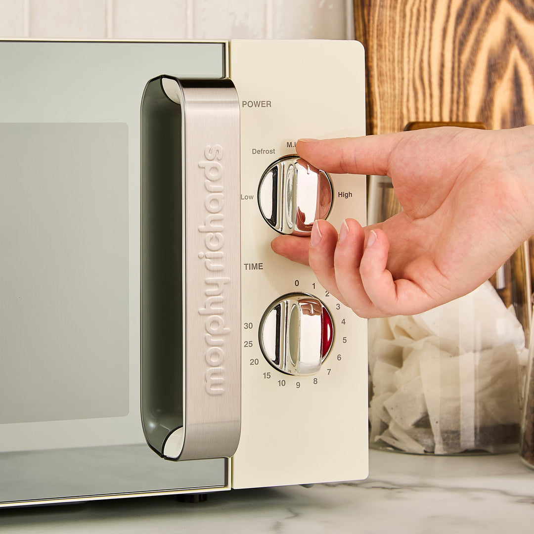 cream microwave on kitchen counter