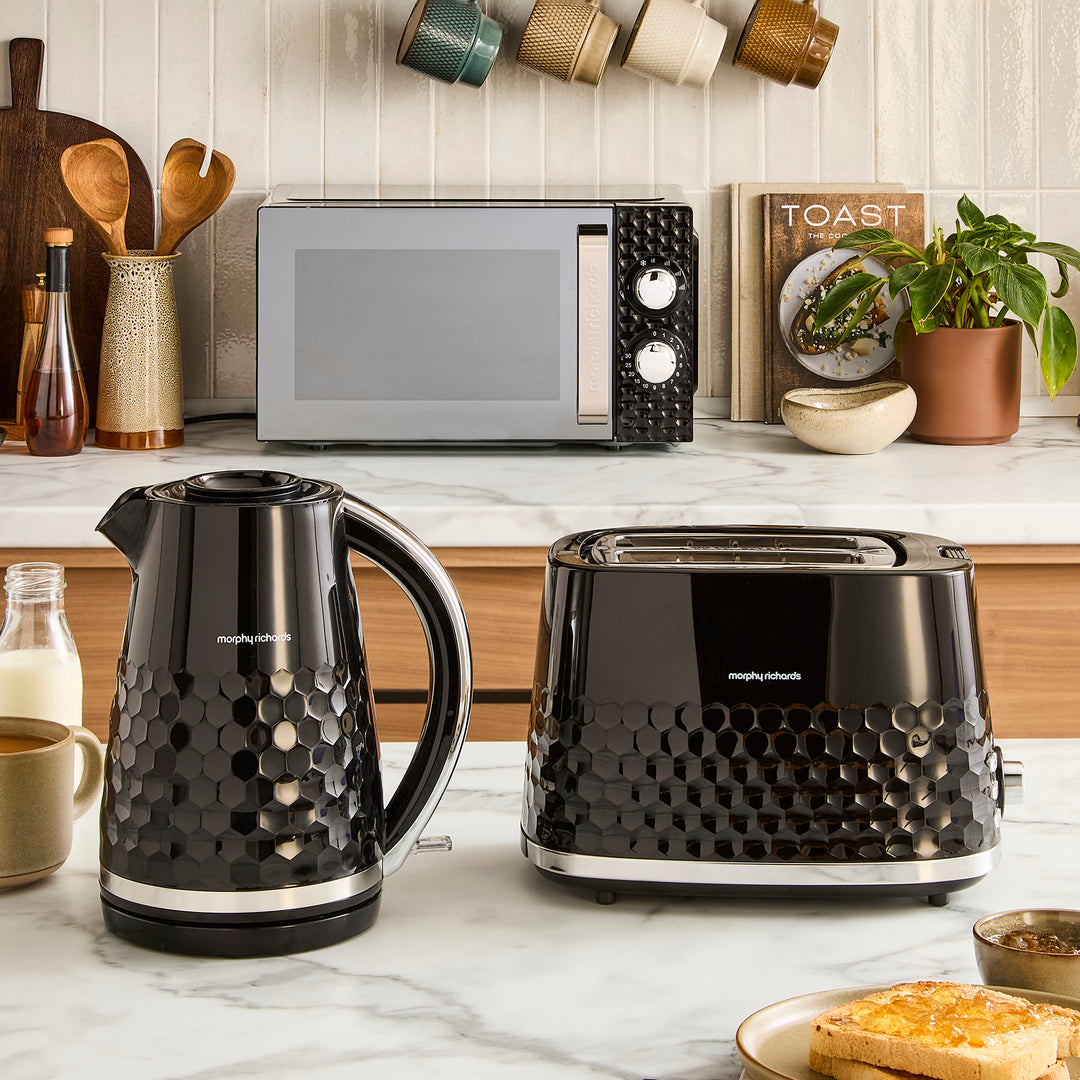 matching kettle, toaster and microwave set in kitchen