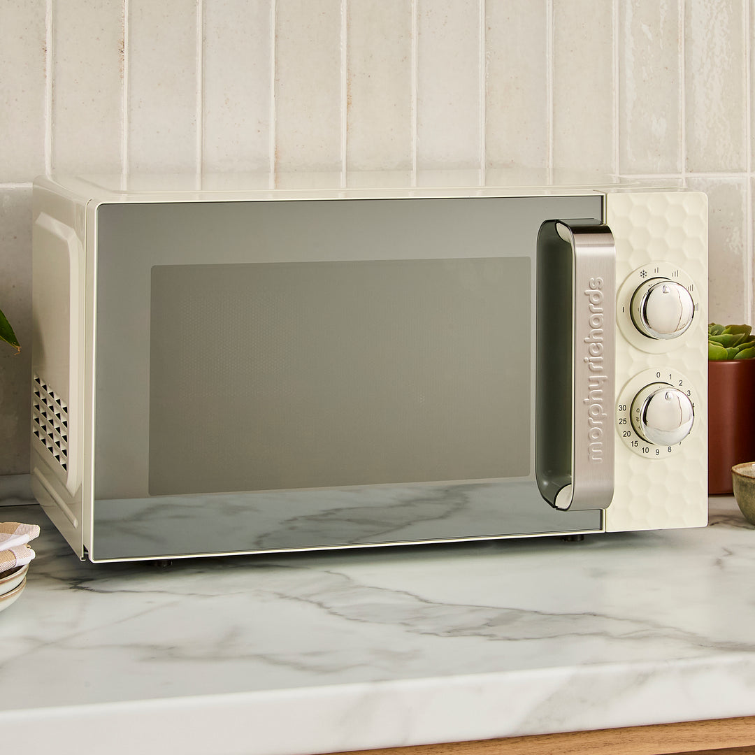 cream microwave on kitchen counter