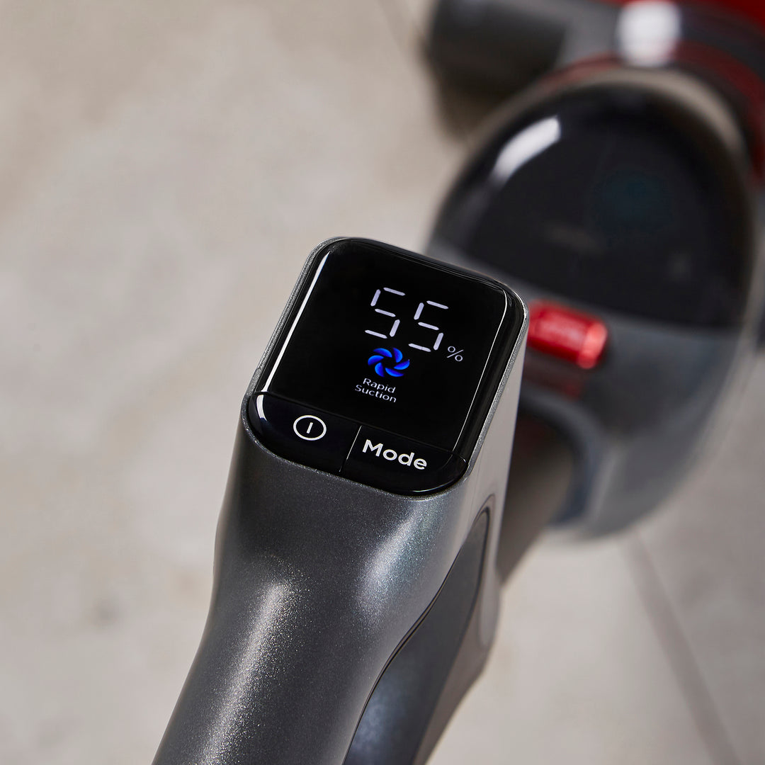 Digital display on Morphy Richards floor cleaner handle with mode and suction settings.