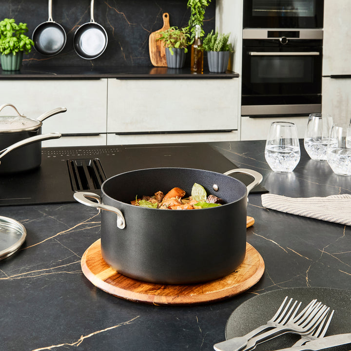 24cm Aluminium Non-Stick Casserole Dish on a granite countertop