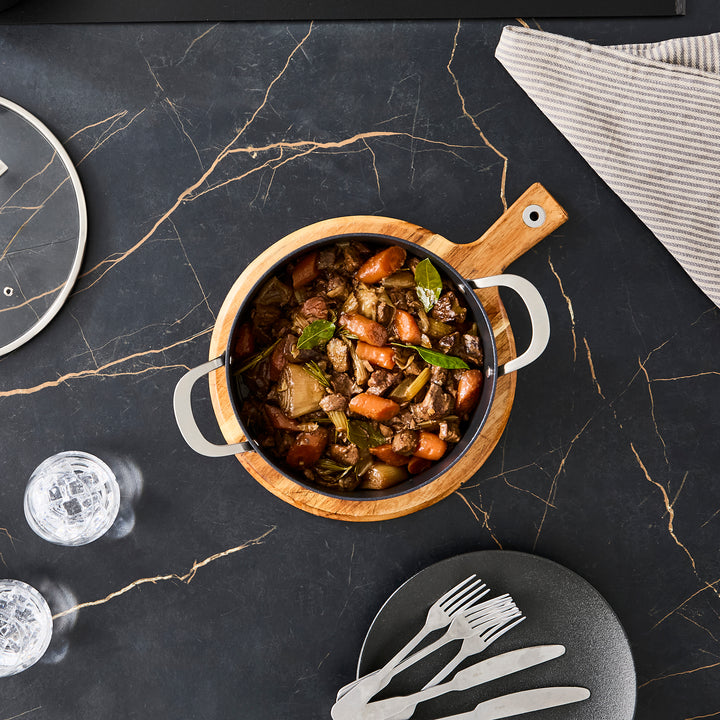 24cm Aluminium Non-Stick Casserole Dish on a granite countertop
