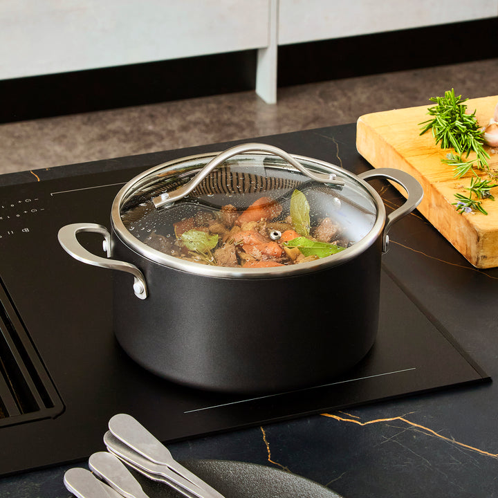 24cm Aluminium Non-Stick Casserole Dish on a granite countertop