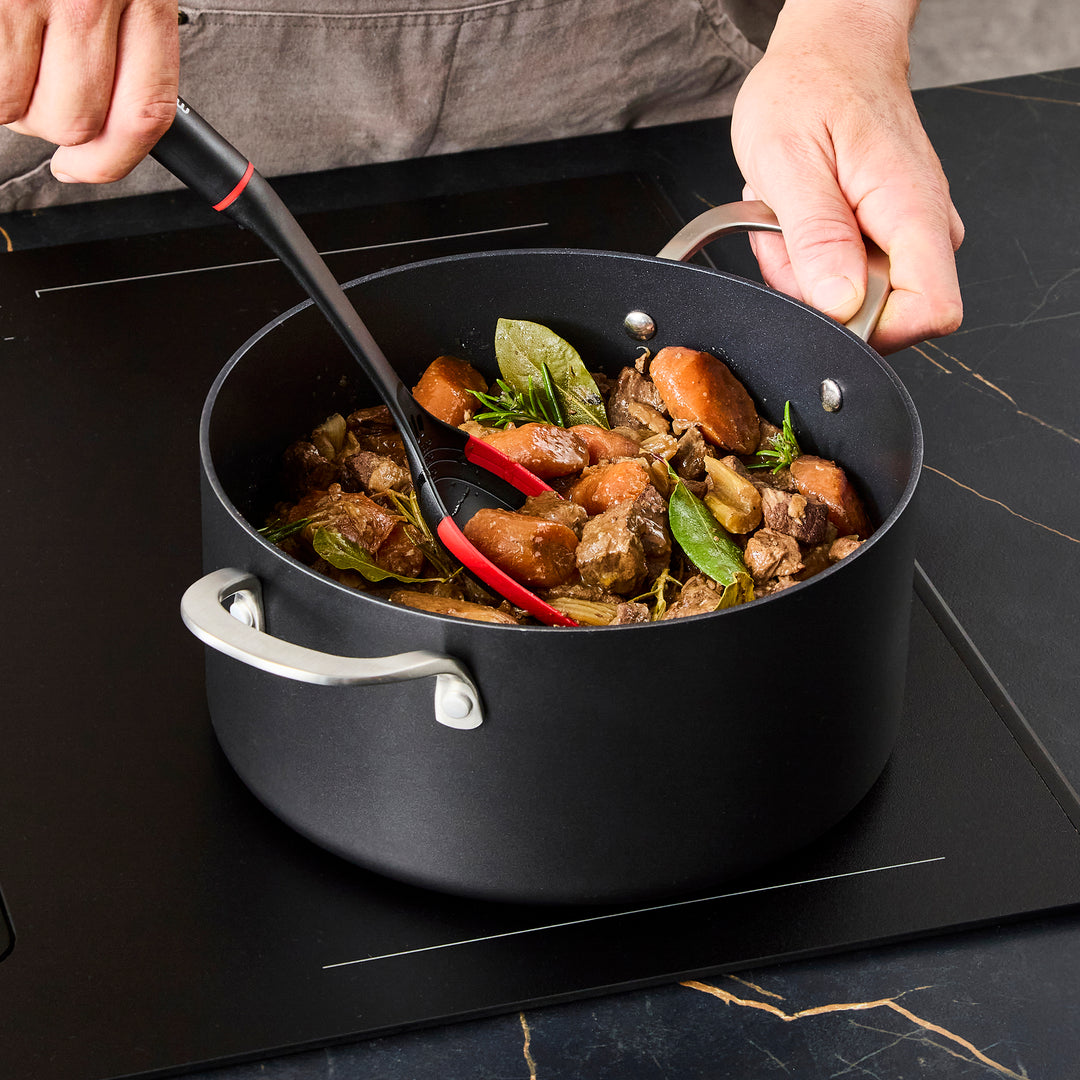 24cm Aluminium Non-Stick Casserole Dish on a granite countertop