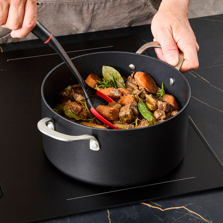24cm Aluminium Non-Stick Casserole Dish on a granite countertop