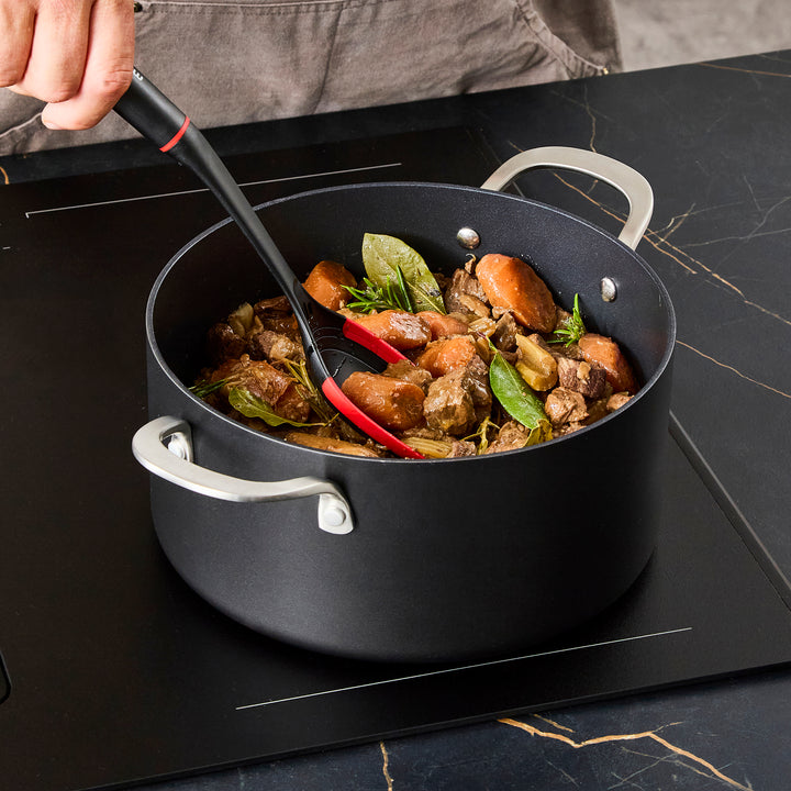 24cm Aluminium Non-Stick Casserole Dish on a granite countertop