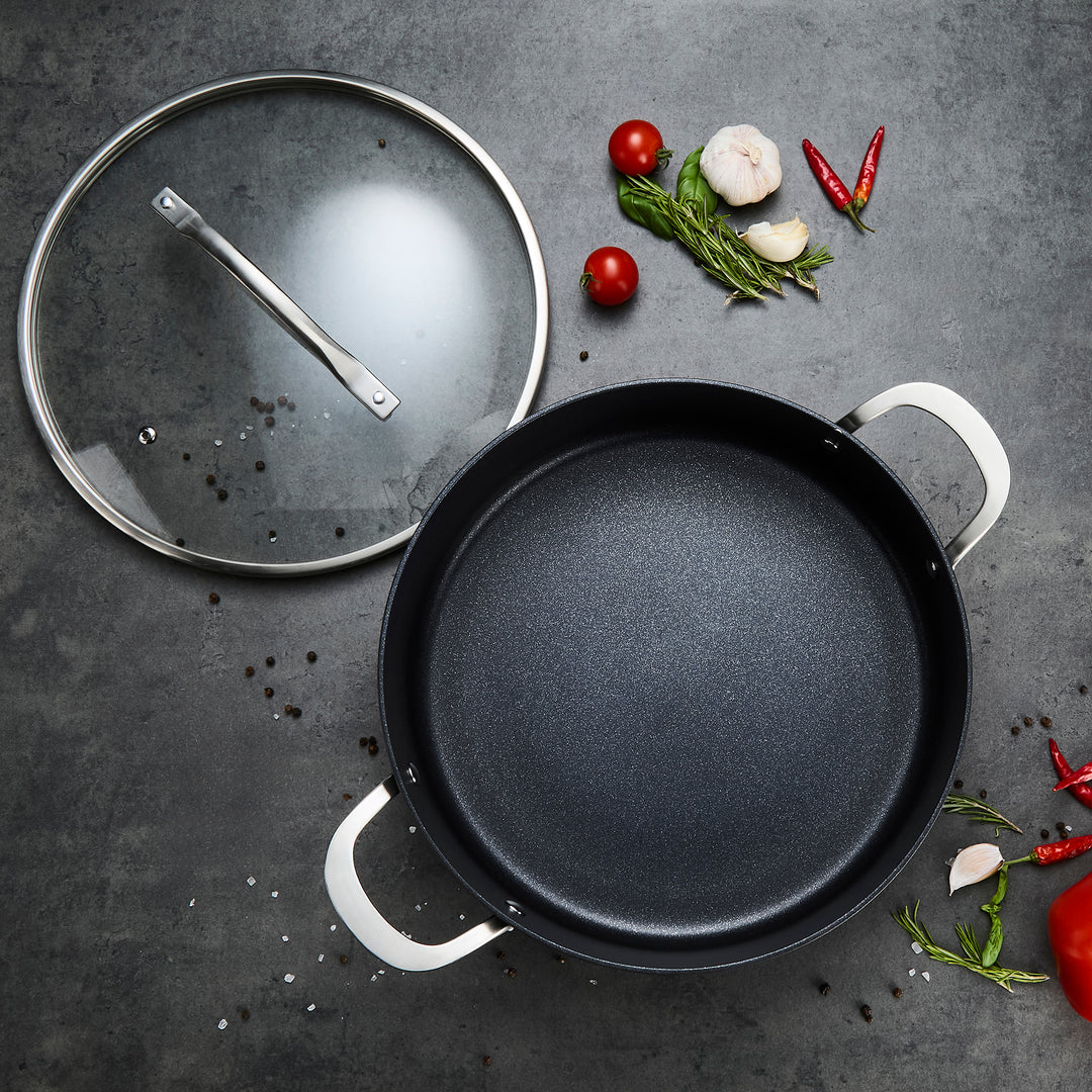 28cm Aluminium Non-Stick Shallow Casserole Dish on a granite countertop