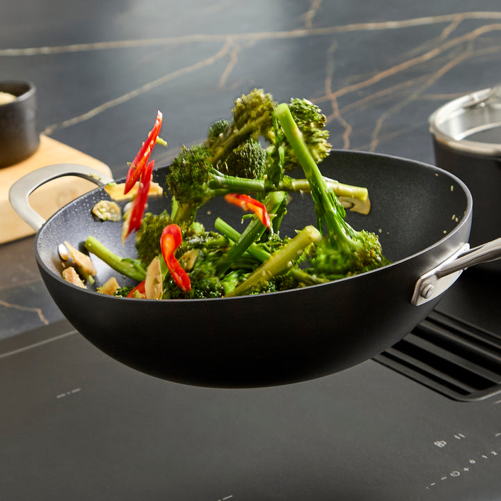 Tossing the Broccoli in the 28cm Stir Fry Pan 