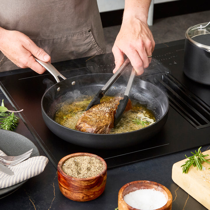 30cm Aluminium Non-Stick Frying Pan, frying steak on an induction hob