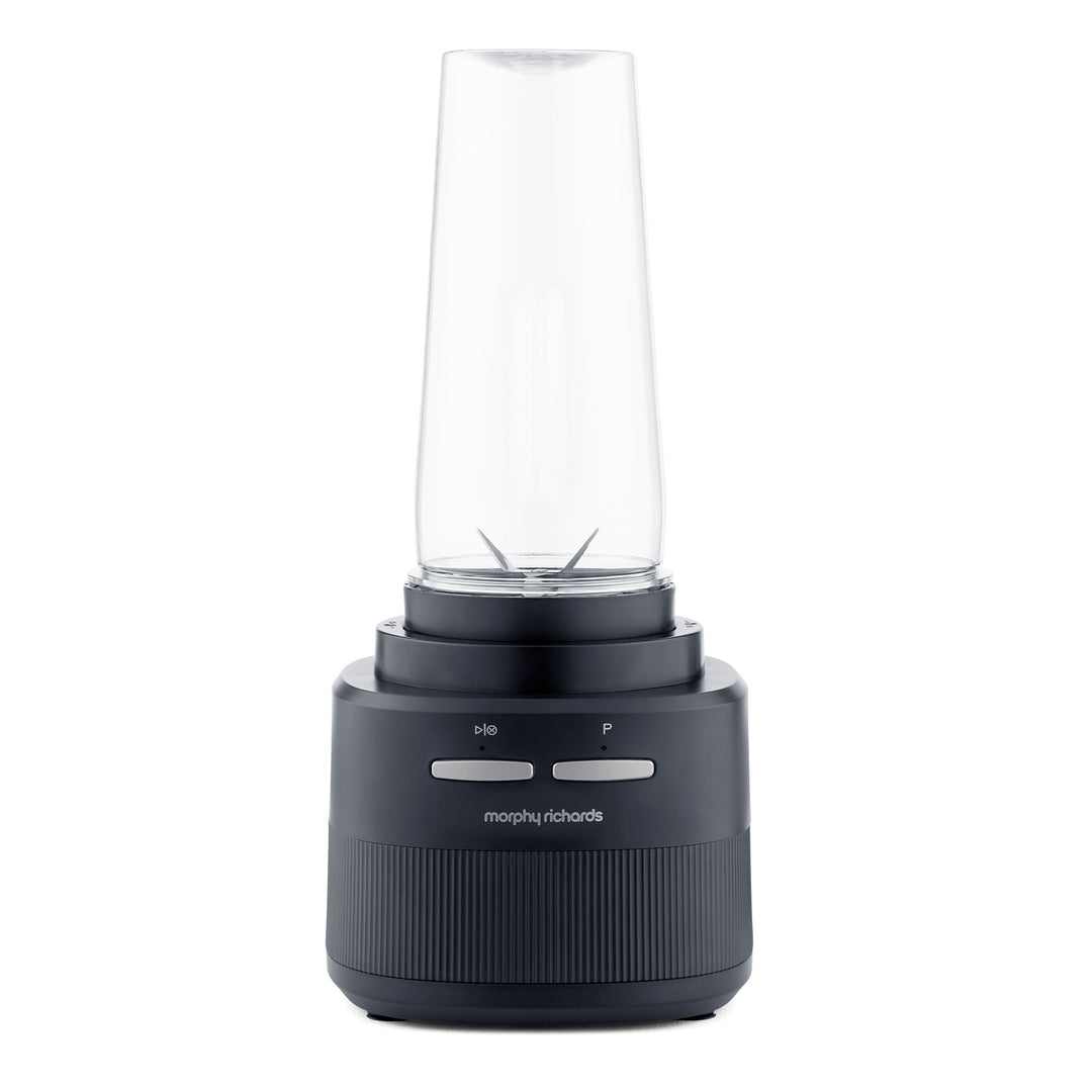 A Morphy Richards personal blender with a dark grey ribbed base, a clear plastic blending cup, and two silver buttons on the front, set against a plain white background.