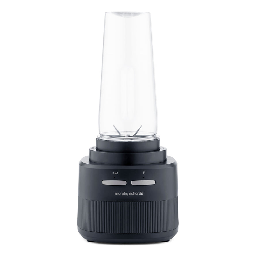 A Morphy Richards personal blender with a dark grey ribbed base, a clear plastic blending cup, and two silver buttons on the front, set against a plain white background.